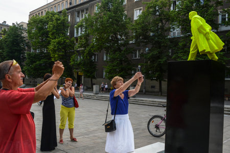 NOWA HUTA, POLAND - JUNE 11, 2014: Fountain of the Future Project as part of the Artboom Krakow Festival (grotesque bright green Vladimir Lenin do urination)のeditorial素材