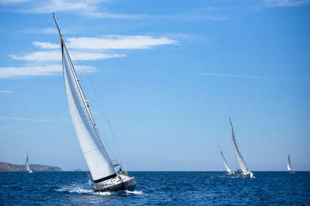 Sailing in the wind through the waves.の写真素材