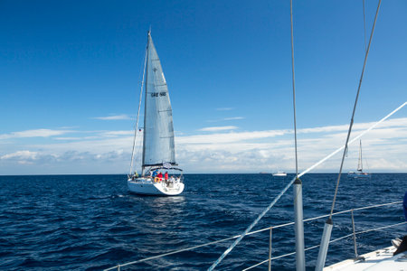 AEGEAN SEA, GREECE - MAY 7, 2014: Unidentified sailboats participate in sailing regatta 11th Ellada...