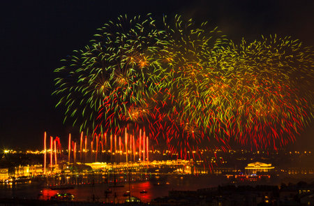 ST.PETERSBURG, RUSSIA - JUN 20, 2014: Light show and firework with a frigate with scarlet sails floating on the Neva River. In 2014, the festival Scarlet Sails celebrates its tenth anniversary.のeditorial素材