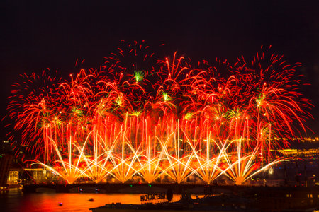 ST.PETERSBURG, RUSSIA - JUN 20, 2014: Light show and firework with a frigate with scarlet sails floating on the Neva River. In 2014, the festival Scarlet Sails celebrates its tenth anniversary.のeditorial素材