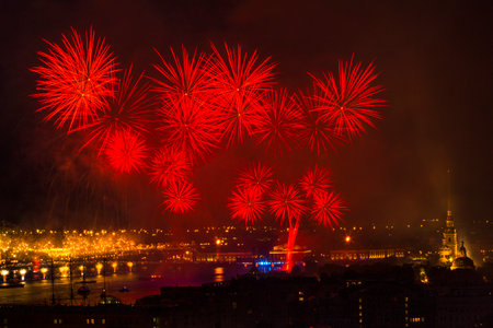 ST.PETERSBURG, RUSSIA - JUN 20, 2014: Light show and firework with a frigate with scarlet sails floating on the Neva River. In 2014, the festival Scarlet Sails celebrates its tenth anniversary.のeditorial素材