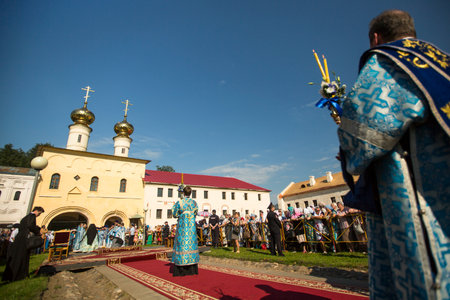 TIKHVIN, RUSSIA - JULY 9, 2014: Unidentified participants Orthodox divine Liturgy on the occasion...