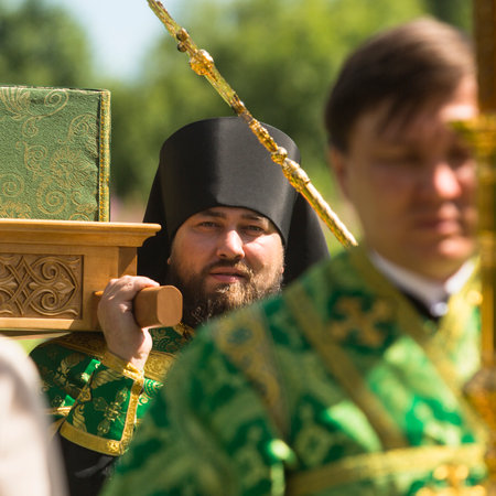 KRASNY BRONEVIK, RUSSIA - JULY 7, 2014: Celebrations commemorating the Rev. Anthony Dymsky (died 1224) in Antony Dymsky Monastery - Procession on Lake Dymsky, the great blessing of water and bathing.のeditorial素材