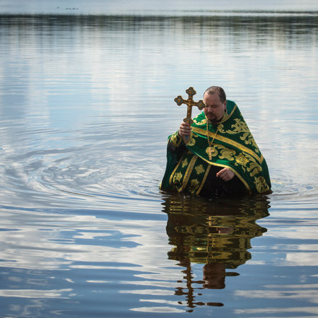 KRASNY BRONEVIK, RUSSIA - JULY 7, 2014: Celebrations commemorating the Rev. Anthony Dymsky (died 1224) in Antony Dymsky Monastery - Procession on Lake Dymsky, the great blessing of water and bathing.のeditorial素材