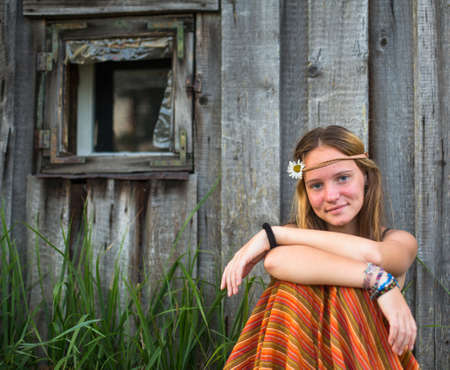 Young lovely girl outdoors in village.の写真素材