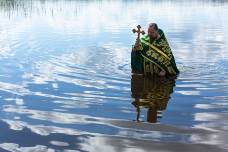 KRASNY BRONEVIK, RUSSIA - JULY 7, 2014: Celebrations commemorating the Rev. Anthony Dymsky (died 1224) in Antony Dymsky Monastery - Procession on Lake Dymsky, the great blessing of water and bathing.のeditorial素材