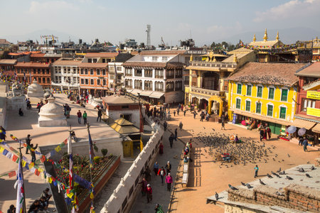 KATHMANDU, NEPAL - DEC 11, 2013: Unidentified pilgrims near stupa Boudhanath. Stupa is one of the largest in the world, of 1979 is a UNESCO World Heritage Site.のeditorial素材
