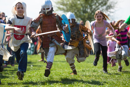 KRAKOW, POLAND - APR 22, 2014: Unidentified participants of Rekawka - Polish tradition, celebrated in Krakow on Tuesday after Easter. Currently has the character of festival historical reconstruction.のeditorial素材