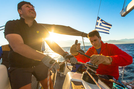 PATRAS, GREECE - OCT 2, 2014: Unidentified sailors participate in sailing regatta "12th Ellada Autumn 2014" on Aegean Sea.のeditorial素材
