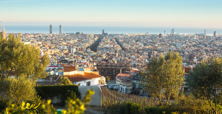 BARCELONA, SPAIN - DEC 25: Panorama of Barcelona from park Guel on a sunset. Barcelona is the capital city of Catalonia in Spain and the country's 2nd largest city, with a population of 1.6 million.のeditorial素材