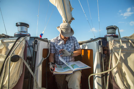 HYDRA, GREECE - CIRCA OCT, 2014: Unidentified sailors participate in sailing regatta 12th Ellada Autumn 2014 among Greek island group in the Aegean Sea, in Cyclades and Argo-Saronic Gulf.のeditorial素材