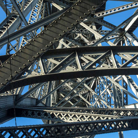 Bottom view of metalworks famous Dom Luis I Bridge in Porto, Portugal.の写真素材