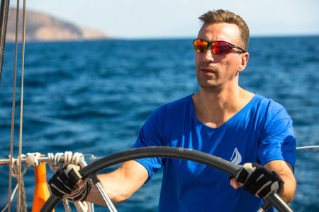 HYDRA, GREECE - CIRCA OCT, 2014: Unidentified sailors participate in sailing regatta 12th Ellada Autumn 2014 among Greek island group in the Aegean Sea, in Cyclades and Argo-Saronic Gulf.のeditorial素材