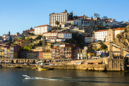 PORTO, PORTUGAL - CIRCA FEB, 2015: Ribeira, traditional boats at Douro river in Old Town. In 1996, UNESCO recognised Old Town of Porto as a World Heritage Site.のeditorial素材