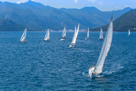 MARMARIS, TURKEY - CIRCA MAY, 2012: Unidentified sailors participate in sailing regatta Sail & Fun Trophy from Marmaris to Fethiye in the Mediterranean Sea.のeditorial素材