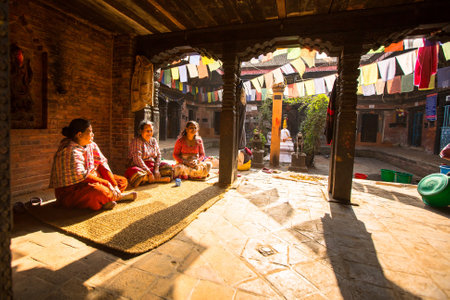 BHAKTAPUR, NEPAL - CIRCA DEC, 2013: Unidentified poor people in his house. The caste system is still intact today but the rules are not as rigid as they were in the past.のeditorial素材