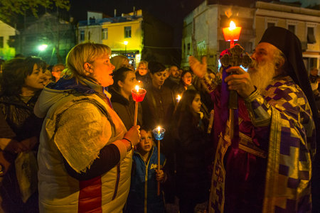 ATHENS, GREECE - APR 10, 2015: Unidentified people during the celebration of Orthodox Easter -...
