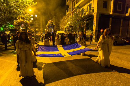ATHENS, GREECE - APR 10, 2015: Unidentified people during the celebration of Orthodox Easter - Vespers on Great Friday (the Epitaphios in Greek served in Good Friday evening).のeditorial素材