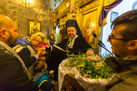 ATHENS, GREECE - APR 10, 2015: Unidentified people during the celebration of Orthodox Easter - Vespers on Great Friday (the Epitaphios in Greek served in Good Friday evening).のeditorial素材