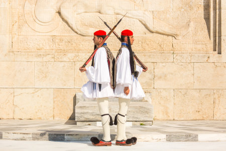 ATHENS, GREECE - APR 13, 2015: Evzone guarding the Tomb of the Unknown Soldier in Athens dressed in full dress uniform, refers to the members of the Presidential Guard, an elite ceremonial unit.のeditorial素材