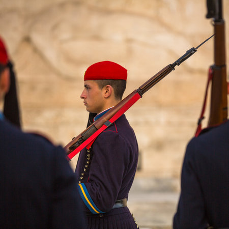 ATHENS, GREECE - APR 14, 2015: Greek soldiers Evzones (or Evzoni) dressed in service uniform, refers to the members of the Presidential Guard, an elite ceremonial unit, active from 1833 - present.のeditorial素材