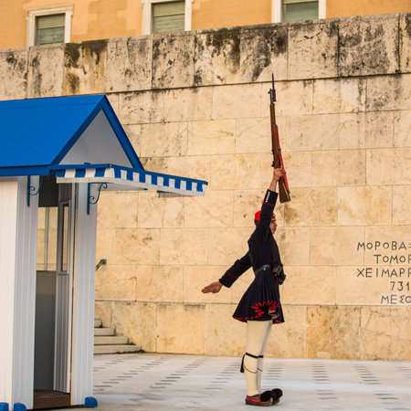 ATHENS, GREECE - APR 14, 2015: Greek soldiers Evzones (or Evzoni) dressed in service uniform, refers to the members of the Presidential Guard, an elite ceremonial unit, active from 1833 - present.のeditorial素材