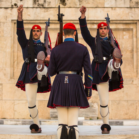 ATHENS, GREECE - APR 14, 2015: Greek soldiers Evzones (or Evzoni) dressed in service uniform, refers to the members of the Presidential Guard, an elite ceremonial unit, active from 1833 - present.のeditorial素材