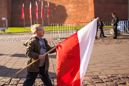 KRAKOW, POLAND - NOV 11, 2014: Unidentified participants celebrating National Independence Day an Republic of Poland - is a public holiday, celebrated every year from 1918 year.のeditorial素材