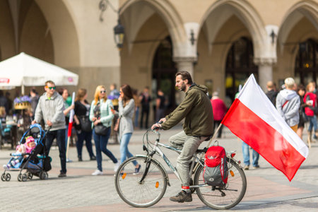 KRAKOW, POLAND - MAY 2, 2015: During Flag Day of the Republic of Polish - is national festival introduced by the Act of 20 Feb 2004. On the same day is celebrated Day of Polonia and Poles Abroad.のeditorial素材