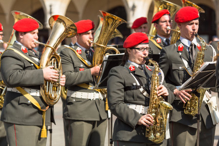 KRAKOW, POLAND - MAY 3, 2015: Military Band on main square of Krakow during annual Polish national and public holiday the Constitution Day. May 3, 1791 was adopted first Constitution of modern Europe.のeditorial素材