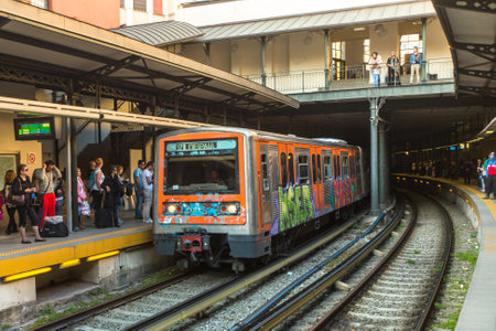 ATHENS, GREECE - APR 13, 2015: Urban metro station with subway train. The Athens Metro is a rapid-transit system opened as a conventional steam railway in 1869, and which was electrified in 1904.のeditorial素材