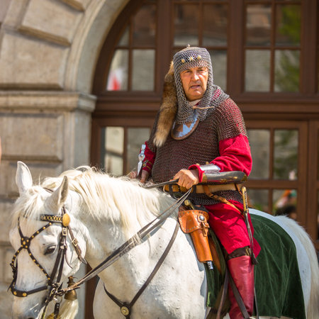 KRAKOW, POLAND - MAY 3, 2015: Unidentified participants annual of Polish national and public holiday the May 3rd Constitution Day. Holiday celebrates declaration of the Constitution of May 3, 1791.のeditorial素材