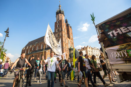 KRAKOW, POLAND - MAY 9, 2015: Unidentified participants of the March For Cannabis Liberation. Marijuana Marches is a global movement manifesto fighting for a rational approach towards hemp plant.のeditorial素材