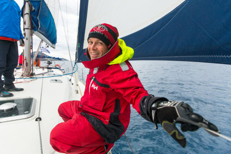 PYLOS, GREECE - CIRCA OCT, 2014: Sailors participate in sailing regatta 12th Ellada Autumn 2014 among Greek island group in the Aegean Sea, in Cyclades and Argo-Saronic Gulf.のeditorial素材