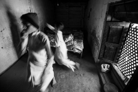 KATHMANDU, NEPAL - CIRCA DEC, 2013: Unknown children after lesson at Jagadguru School. School established at 2013, to let new generation learn Sanskrit and preserve Hindu culture.のeditorial素材