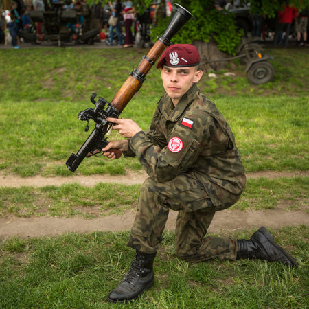 KRAKOW, POLAND - MAY 3, 2015: Polish soldier during demonstration of the military and rescue equipment in the framework annual Polish national and public holiday the Constitution Day May 3rd.のeditorial素材
