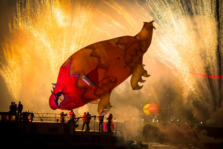 KRAKOW, POLAND - MAY 31, 2015: During the parade of dragons near Wawel Royal Castle at night. Great dragons parade is an annual event dedicated to the symbol of the city, was first held in 2000 year.のeditorial素材