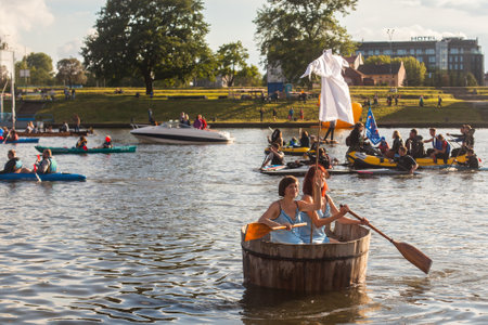 KRAKOW, POLAND - JUNE 21, 2015: Unidentified participants during a public event called 4th Water Critical Mass. The annual event is held for since 2012 under the motto - Vistula for All.のeditorial素材