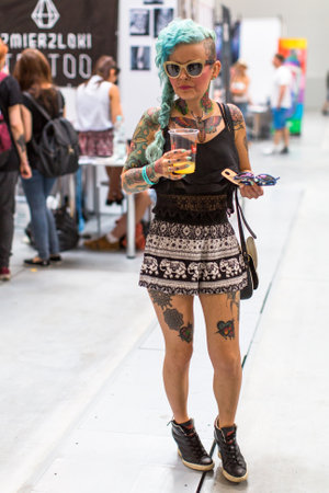 KRAKOW, POLAND - JUNE 6, 2015: Unidentified participants at 10-th International Tattoo Convention in Congress-EXPO Center. This year anniversary TattooFest - tattoo Studio is with an area of 2000m2のeditorial素材