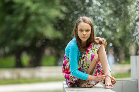 Portrait of little girl outdoors.の写真素材