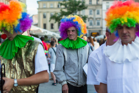 KRAKOW, POLAND - JUL 11, 2015: Unidentified participants at the 28th International Festival of Street Theatres. Annually July 9-12 performances in the Main Square and at random points around the city.のeditorial素材