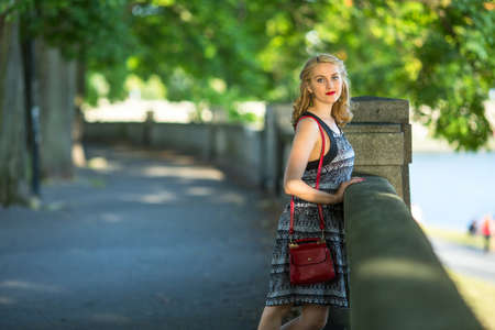 Beautiful young woman portrait in a summer Park.の写真素材