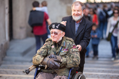 KRAKOW, POLAND - MAY 3, 2015: Unidentified participants annual of Polish national and public holiday the May 3rd Constitution Day. Holiday celebrates declaration of the Constitution of May 3, 1791.のeditorial素材