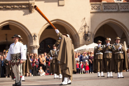 KRAKOW, POLAND - MAY 3, 2015: Military orchestra on main square during annual Polish national and...
