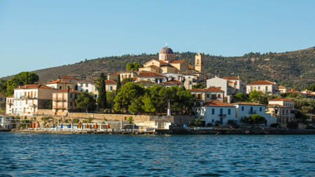 GALAXIDI, GREECE - CIRCA SEP, 2014: View from the sea of buildings and Ortodox temple. Galaxidi is a small port situated on a natural double harbour surrounded by mountains. Population 2,989 human.のeditorial素材