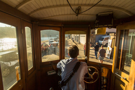 PORTO, PORTUGAL - NOV 7, 2015: In the tram on heritage tourist line on the shores of the Douro. Construction its tram network started in Sep 12 1895, therefore being the first in the Iberian Peninsula.のeditorial素材