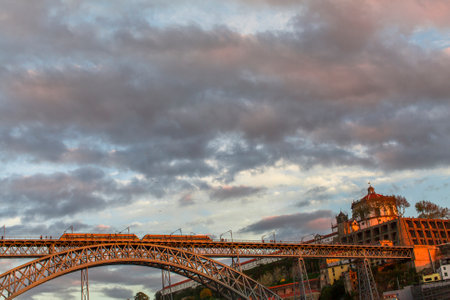 PORTO, PORTUGAL - NOV 6, 2015: Dom Luis I Bridge at center of Old Porto. Porto is one of the oldest...