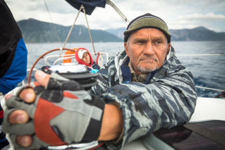 MONEMVASIA, GREECE - CIRCA MAY, 2014: Sailor participate in sailing regatta 11th Ellada 2014 Spring among Greek island group in the Aegean Sea, in Cyclades and Argo-Saronic Gulf.のeditorial素材