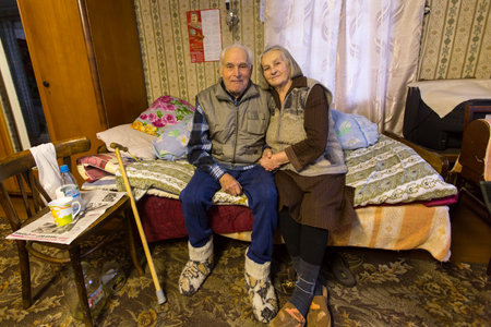VINNITSY, RUSSIA - NOV 30, 2015: Elderly couple Veps - small Finno-Ugric peoples living on the territory of Leningrad region in Russia. According to the 2002 census, there were 8,240 Veps in Russia.のeditorial素材